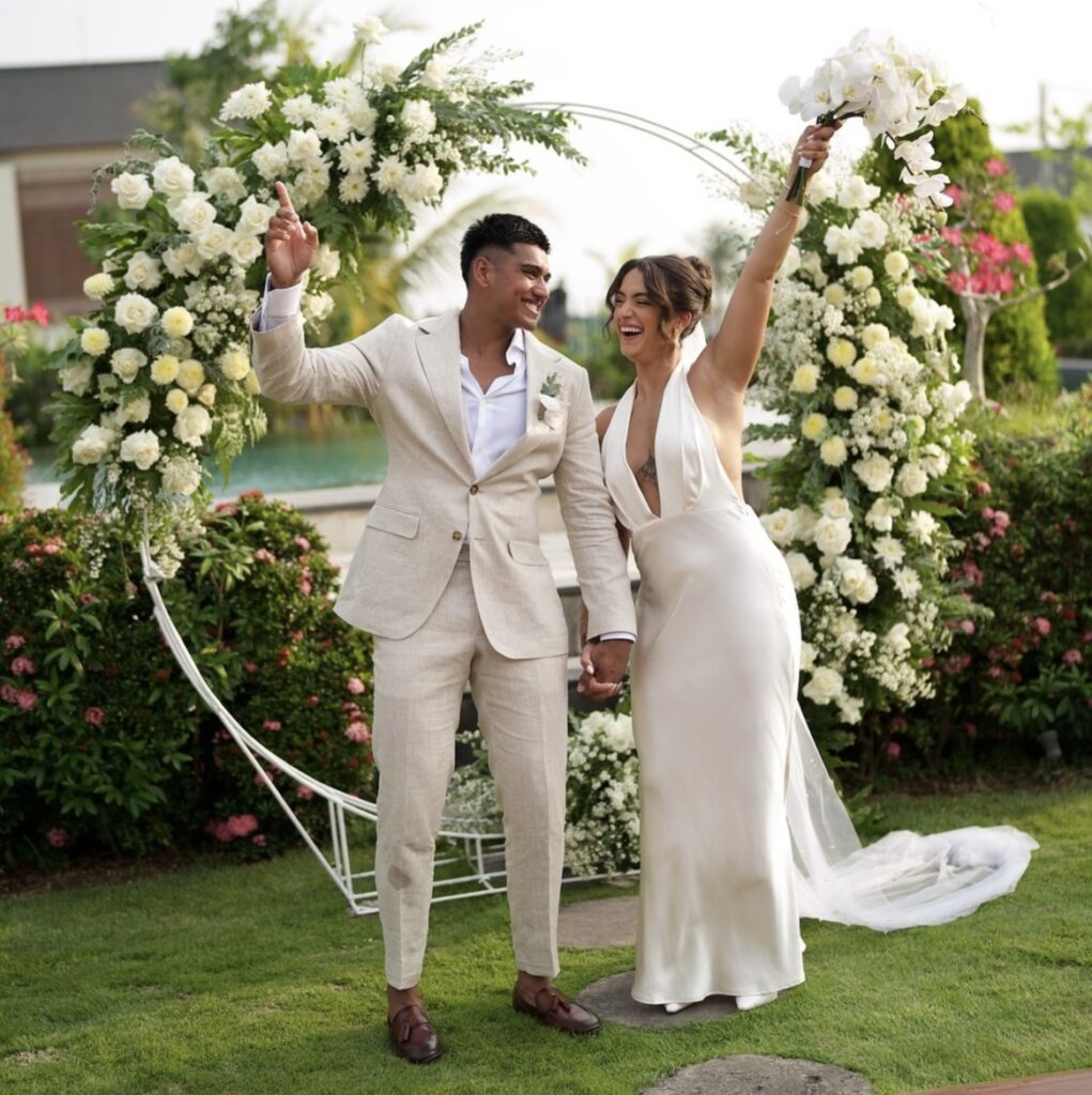 Jess and Ameer joyfully celebrate post-ceremony.